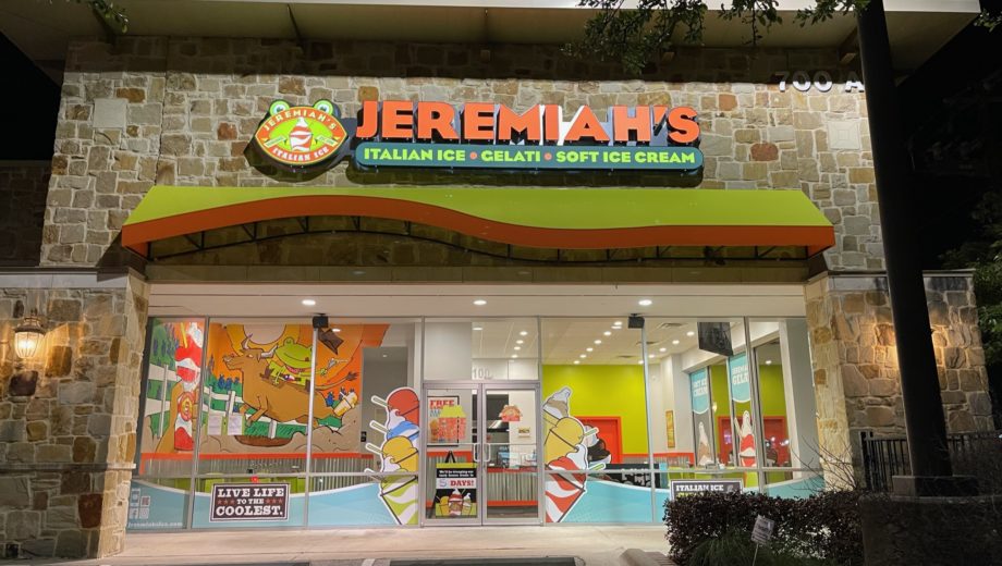 Exterior night shot of a Jeremiah’s Italian Ice franchise in Texas.